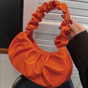 Orange Snatched Purse .